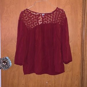Girls Old navy shirt. A large. A maroon like color. Buttons in the back.